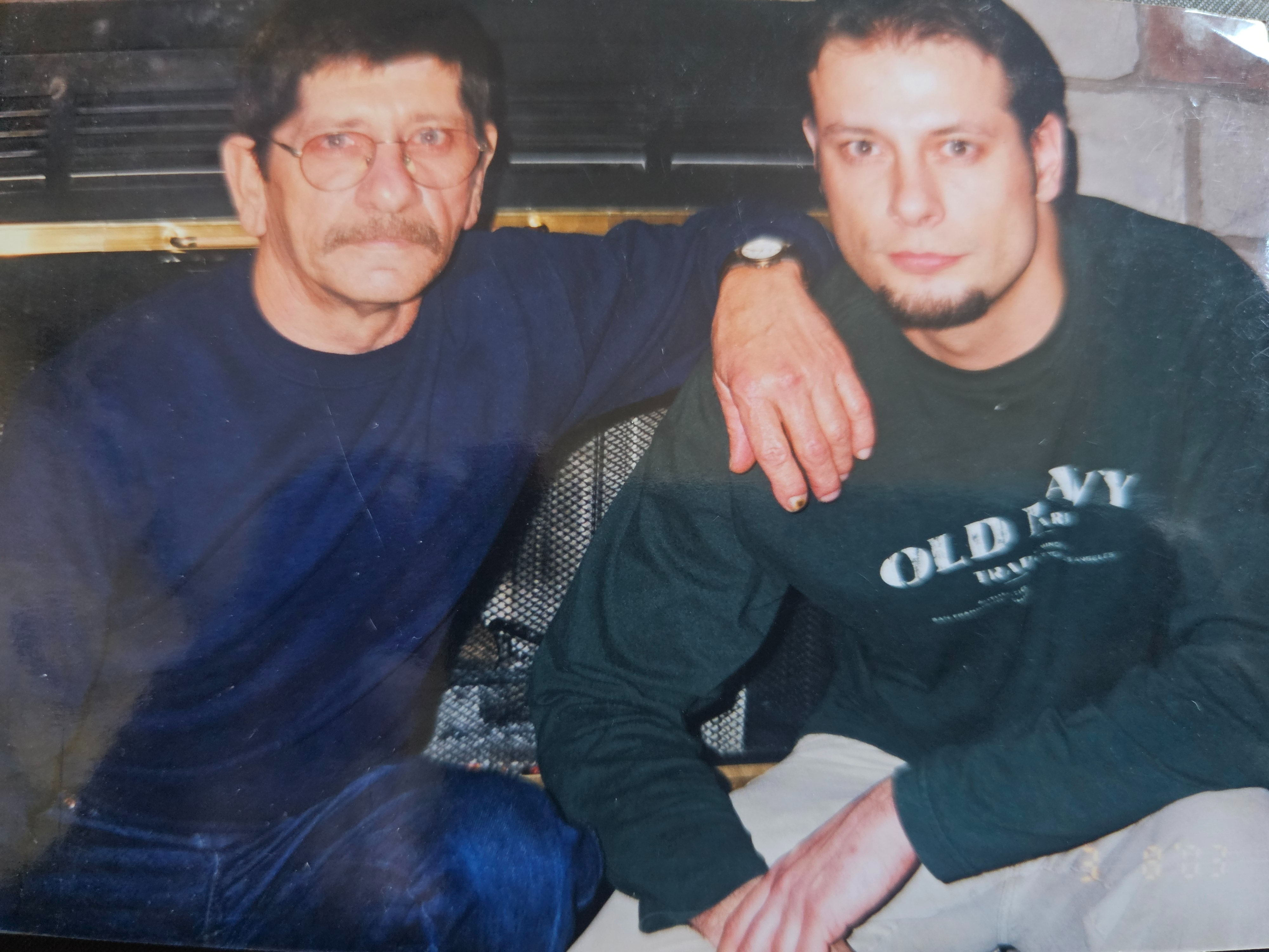 Gary hand on Don's shoulder